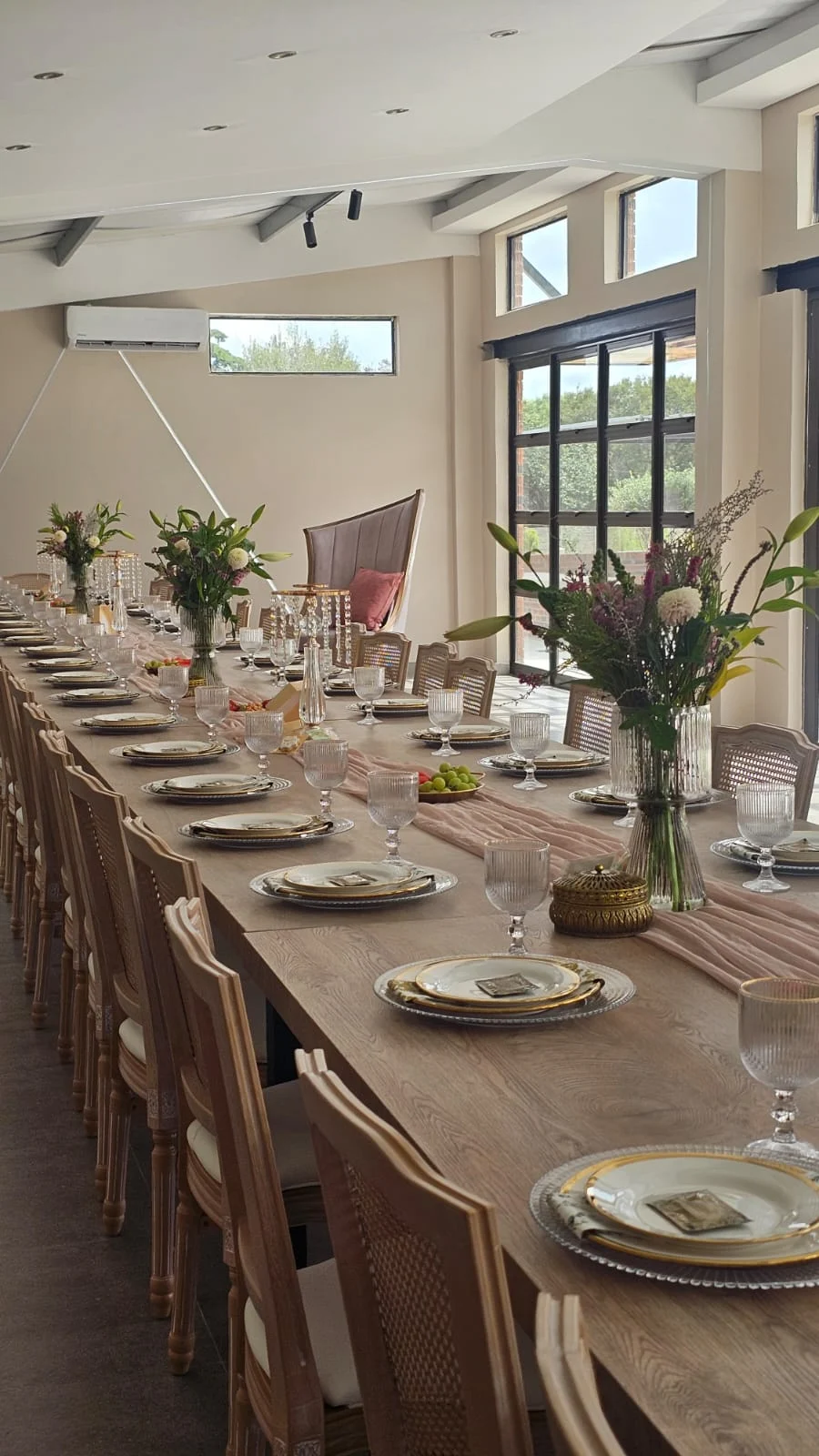 Small venue with a long table and natural light